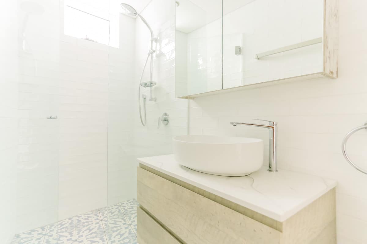 Small Bathroom Renovation in Sylvania Sydney with beach style timber vanity