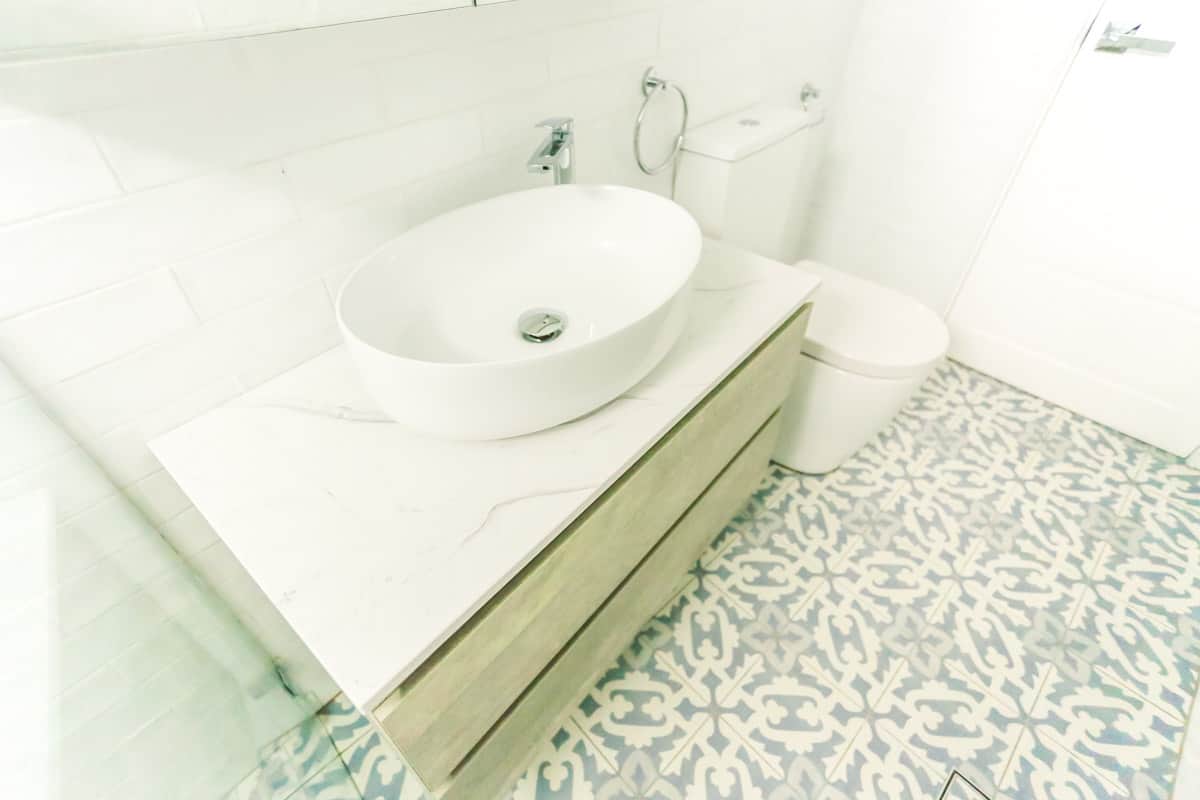 Small Bathroom Renovation in Sylvania Sydney with beach style white vanity top