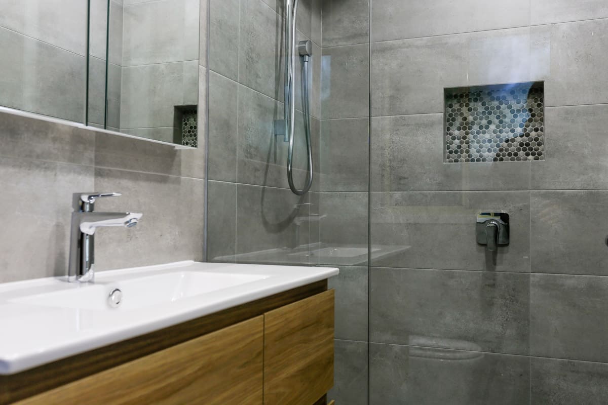 Small bathroom renovation in Sydney with walk in shower and timber wall hung Glacier Ensuite Twin 900 vanity