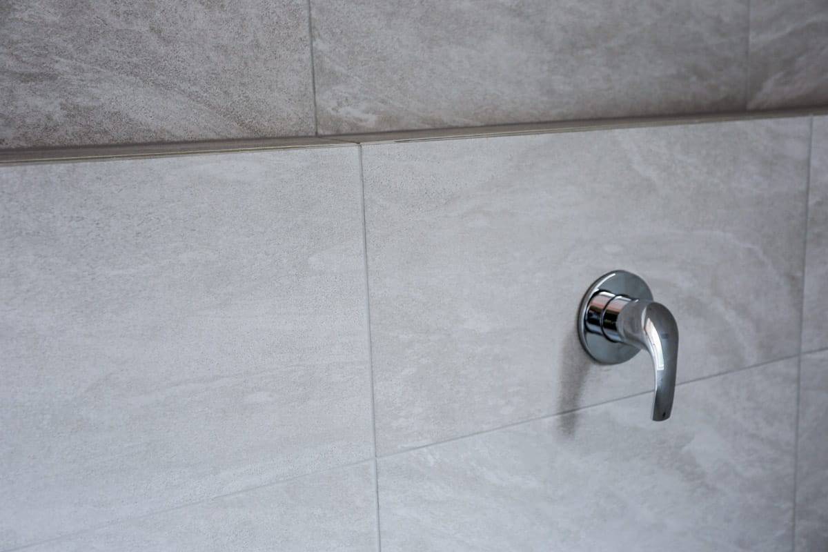 Small Bathroom Renovation With Grohe Tapware photo Bathroom Renovation Sydney with wall tiles