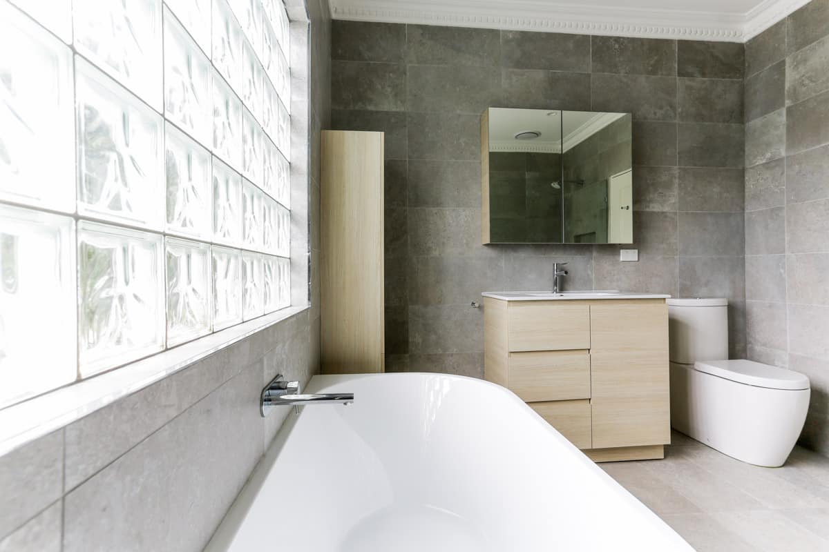 Small Bathroom Renovations With A Freestanding Bath photo Full bathroom renovation with Caroma Forma Close Coupled Back To Wall Rimless Toilet Suite