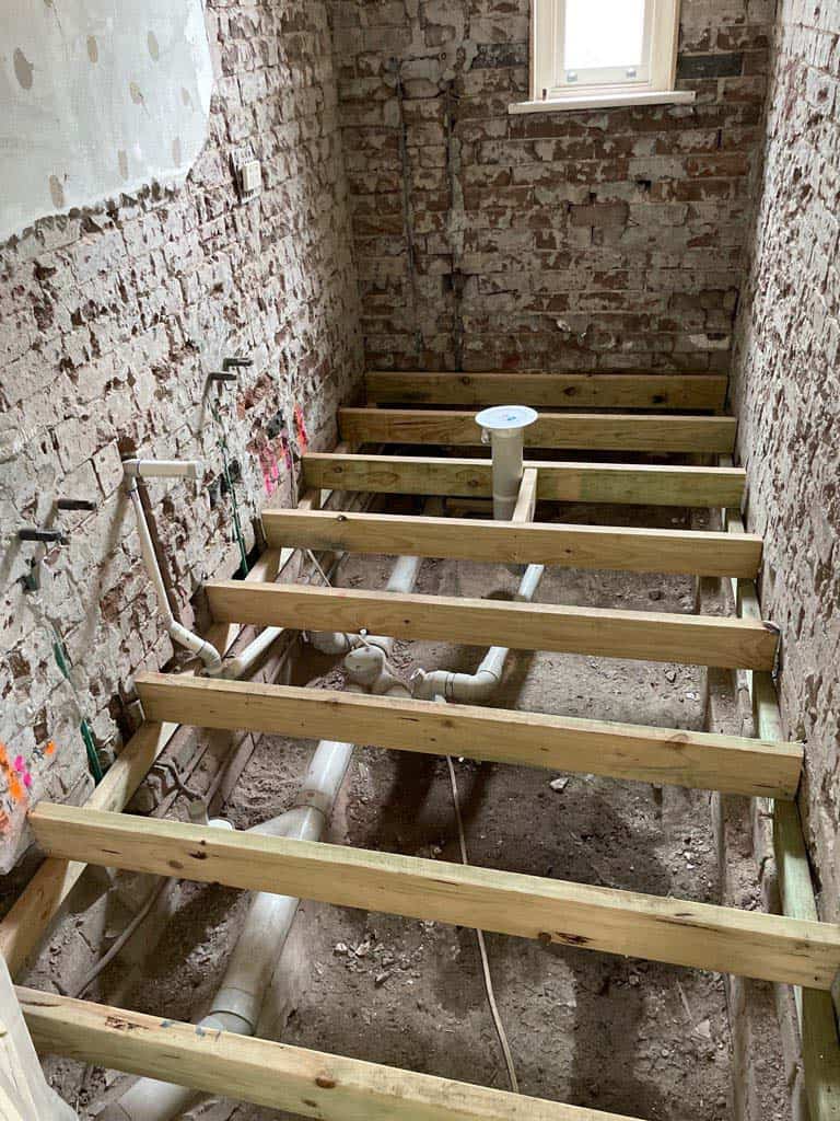 Luxury Bathroom Renovation With Pietro Lombarda Tiling photo Getting-the-floor-ready-for-putting-down-new-tiling-1