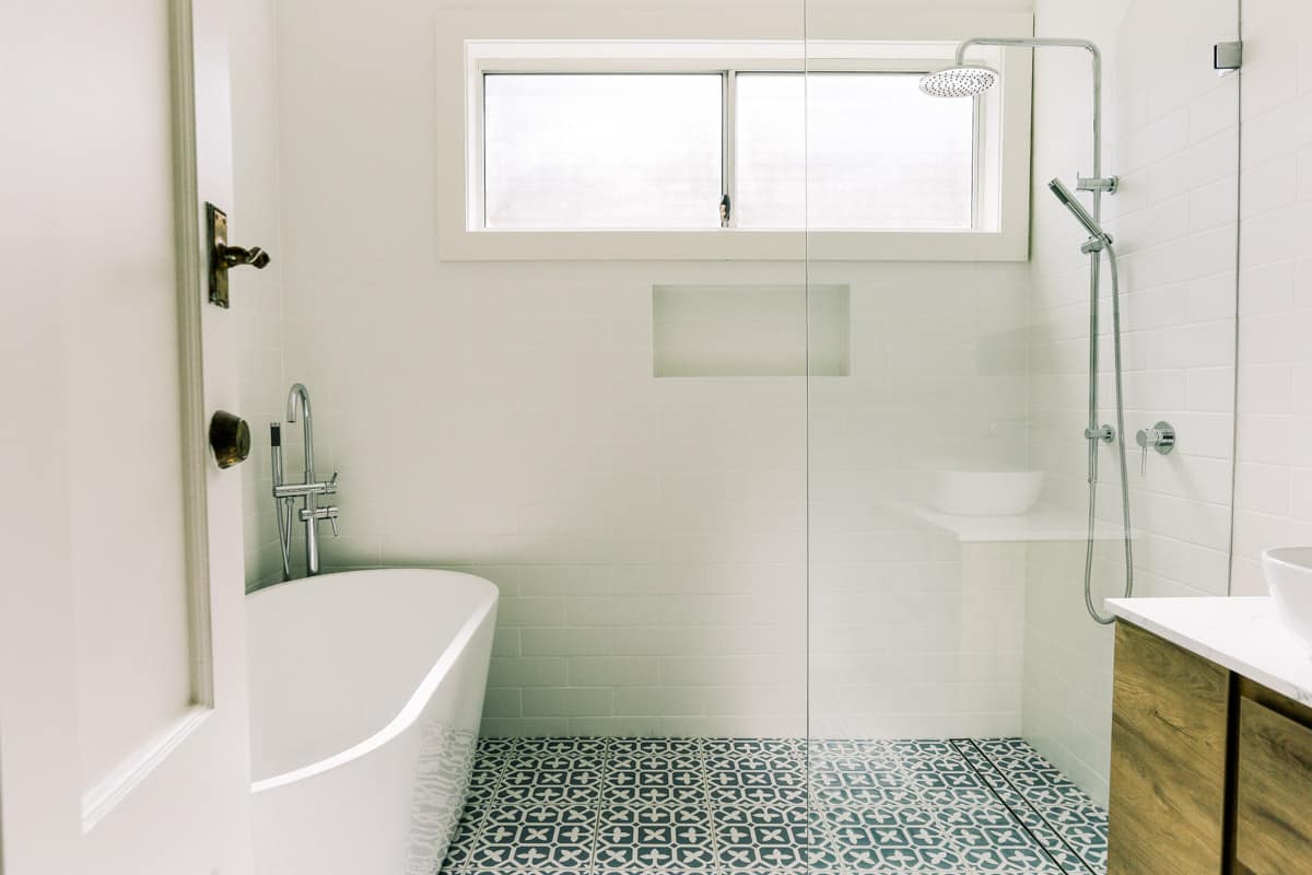 Master Bathroom Renovation in Sutherland with bath tub walk in shower and new floor tiles