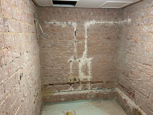 Complete Bathroom Renovation in Sydney With Terrazo Floor Tiles photo Nu Trend Sydney Renovation Contractor Doing a Complete Bathroom Renovation demolition of old room