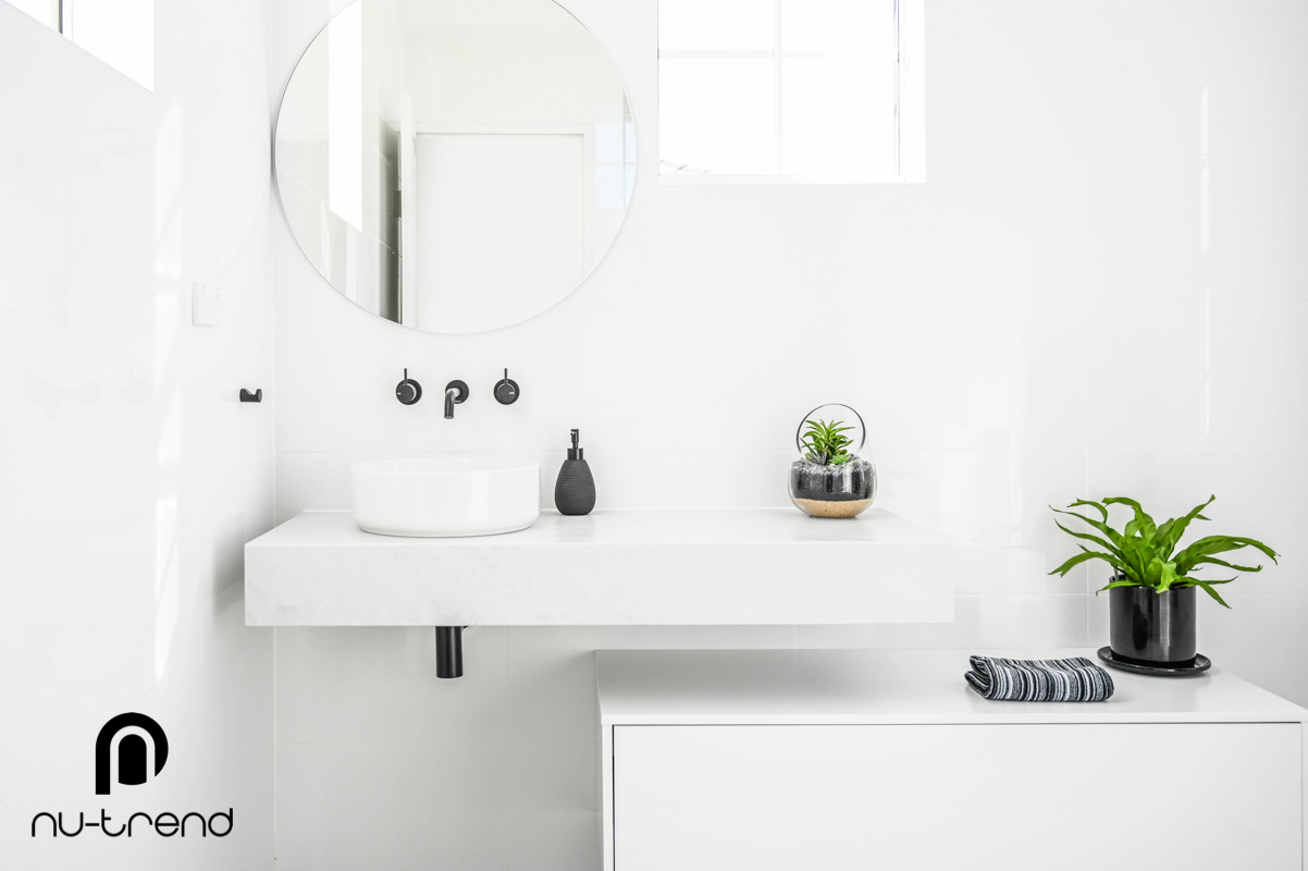 Nu Trend Sydney Renovation Company completed ensuite bathroom with laminate slab top with ceramic offset basin from Bathroom Collective