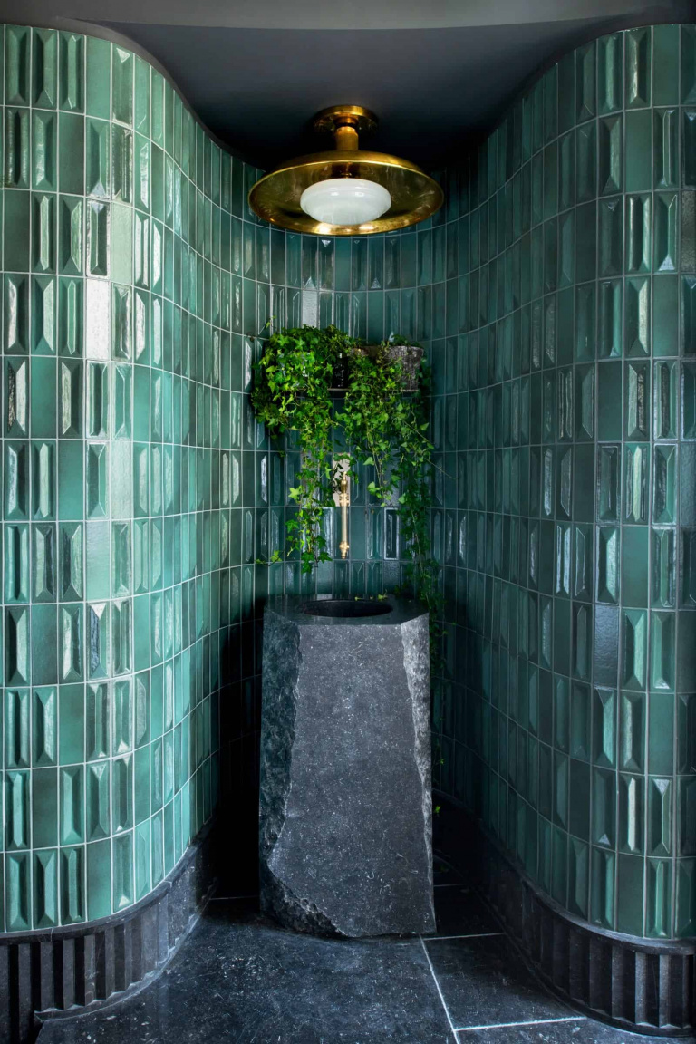 Three Dimensional wall tiling around a bathroom sink