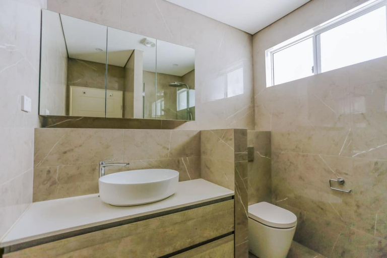 Complete Bathroom Renovation Company photo Bathroom-Renovation-in-Sylvania-Sydney-with-porcelain-marble-look-tiles-in-beige
