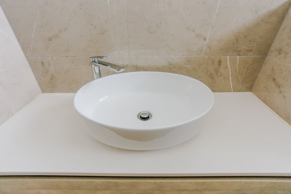 Bathroom Renovation in Sylvania Sydney with porcelain marble look tiles with round sink 1