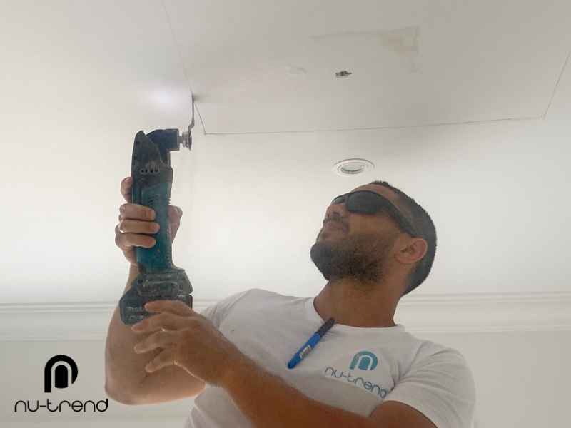 Fix Water Leaks photo Plumber to repair water leak in upstairs bathroom in Sydney - cutting around the damage