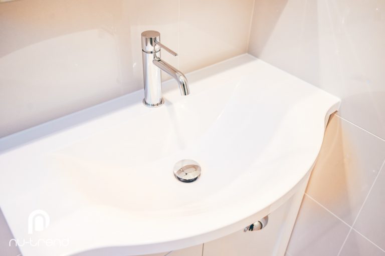 White vanity sink with Pheonix silver tap