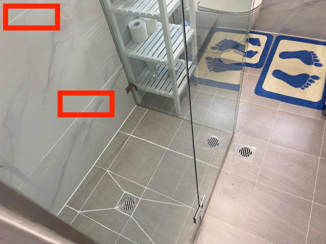 Floor tiles split for no apparent reason in a bathroom renovation