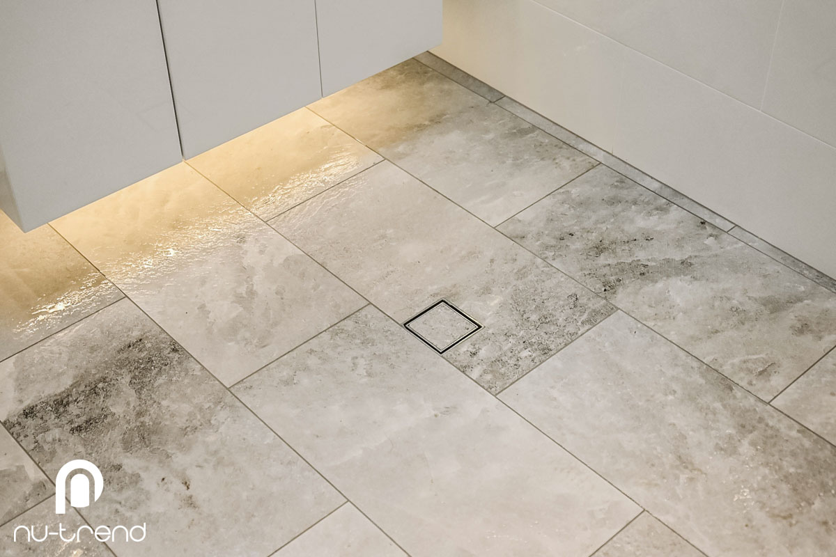 Complete-bathroom-renovation-Leichhardt-new-floor-tiling