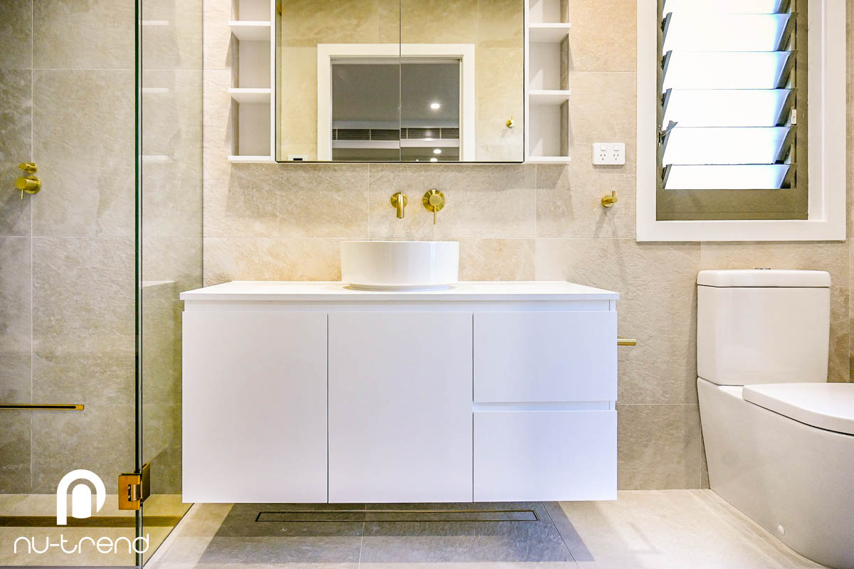 Steam shower installation with white wall hung vanity