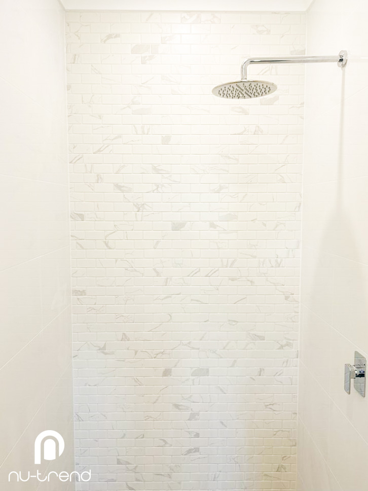 Complete ensuite bathroom renovation in Mortdale Sydney by Nu Trend walk in shower with feature wall