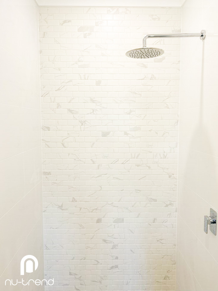 Complete ensuite bathroom renovation in Mortdale photo Complete-ensuite-bathroom-renovation-in-Mortdale-Sydney-by-Nu-Trend-walk-in-shower-with-feature-wall