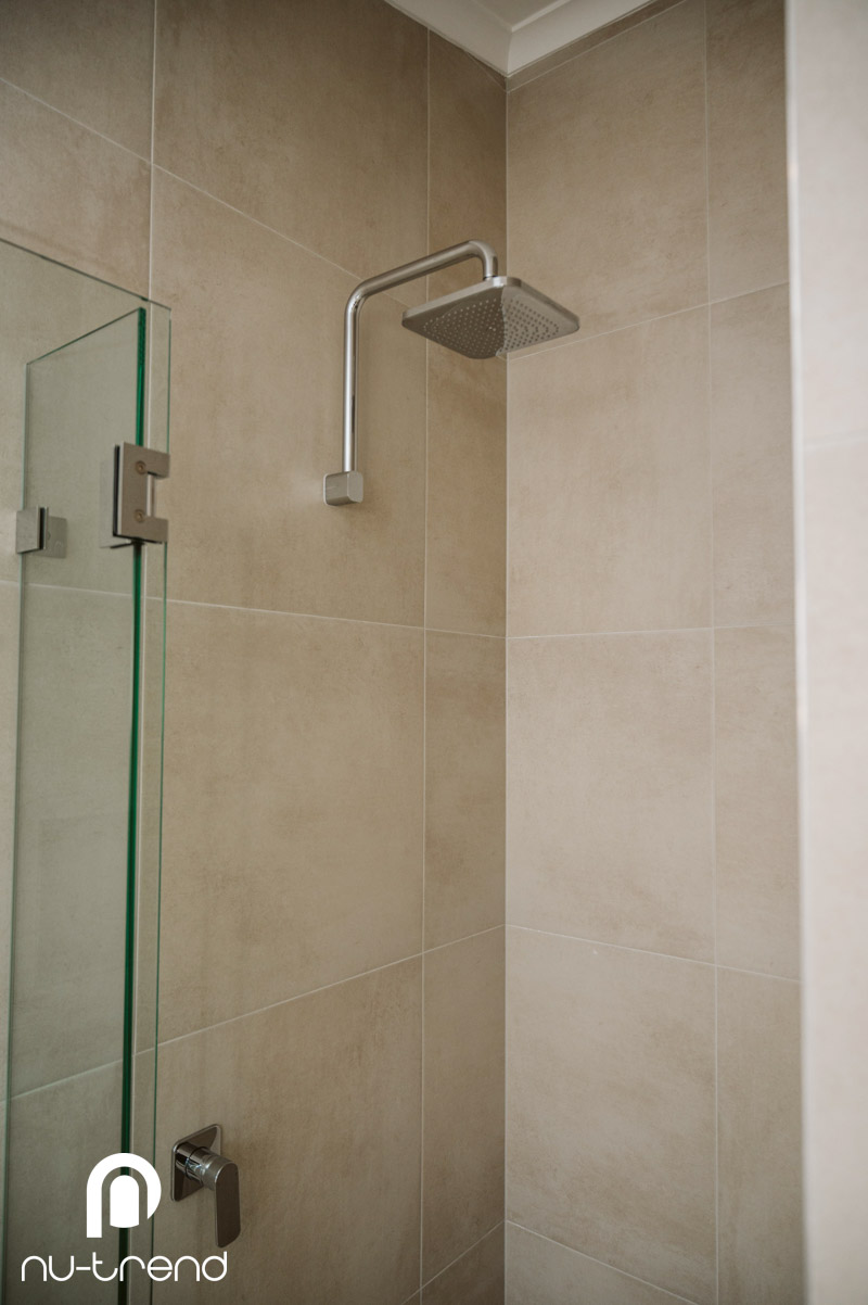 Complete bathroom renovation in Kingsford photo Bathroom renovation in Kingsford walk in shower with silver finishes
