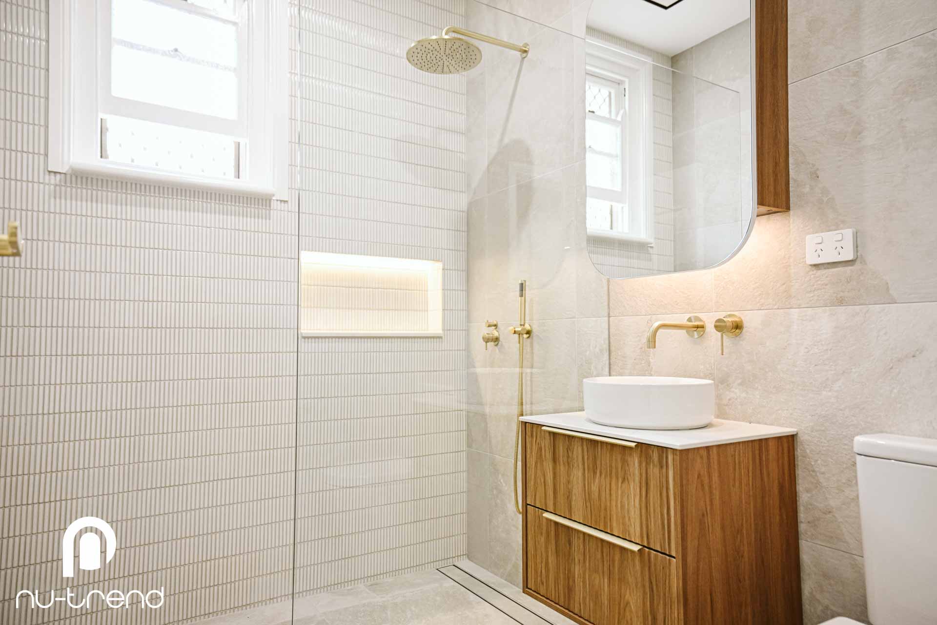 Renovating a bathroom to make it larger new shower and toilet