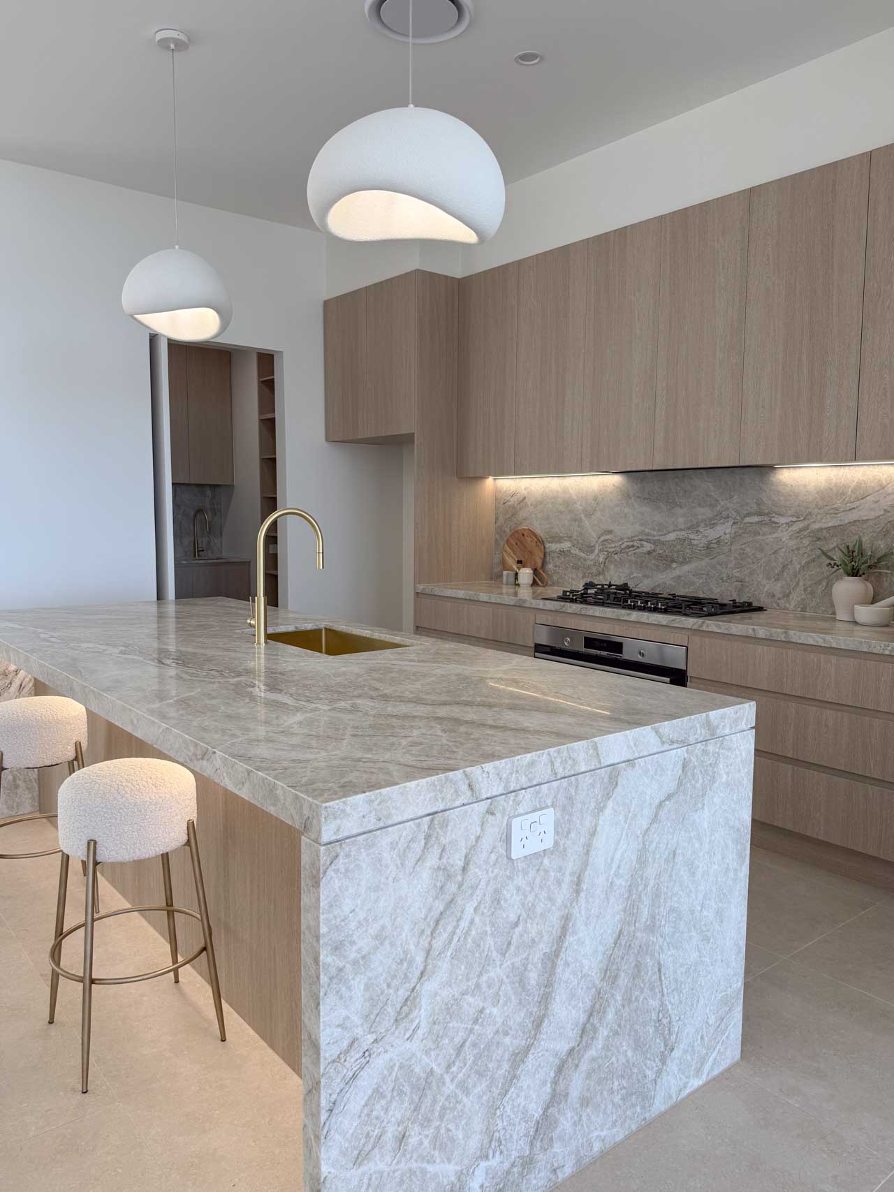 Modern organic luxury kitchen with butler pantry photo