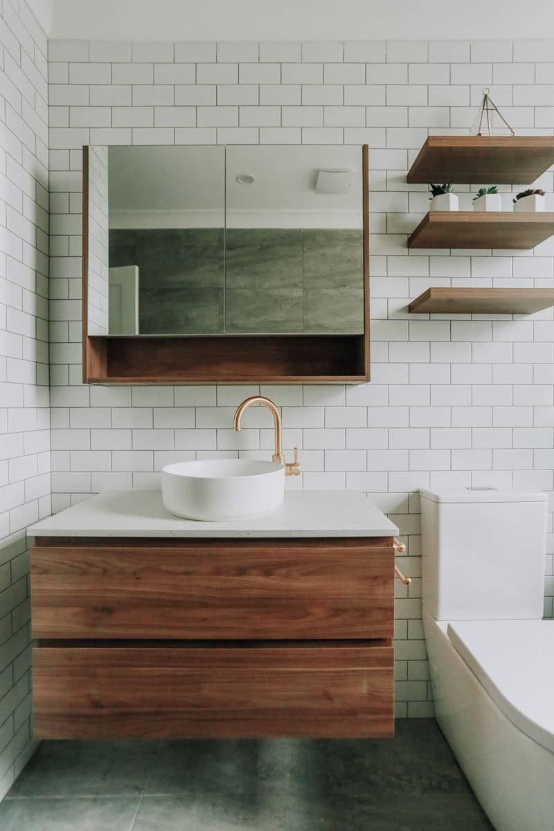 A Nevada wall hung vanity in Frozen Terra Notalo Walnut from Bathroom Collective sample photo in a bathroom renovation