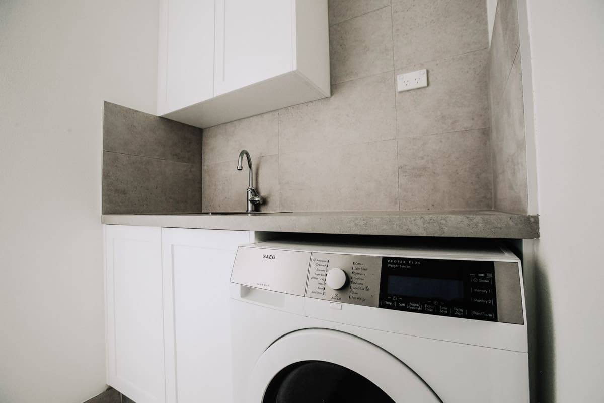 Combined-bathroom-and-laundry-renovation-company-in-Sydney-new-cabinets