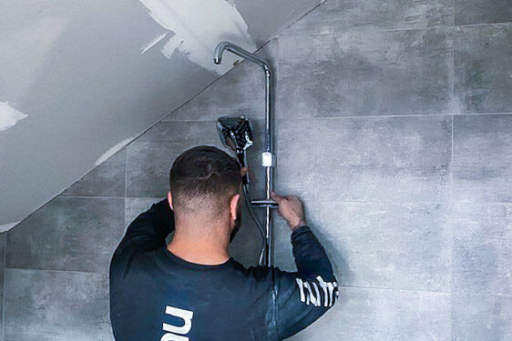 Bathroom renovations photo Commercial small bathroom renovation in Sydney by Nu Trend installing a shower head