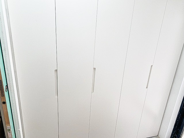 Laundry Renovations photo Nu Trend Bathroom Renovations fitting a new cupboard and storage area on a property