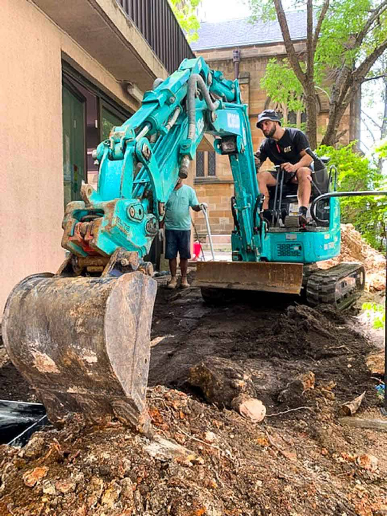 Nu-Trend Sydney plumber removing tree roots from a storm water line for a blocked drain and new pipe installations