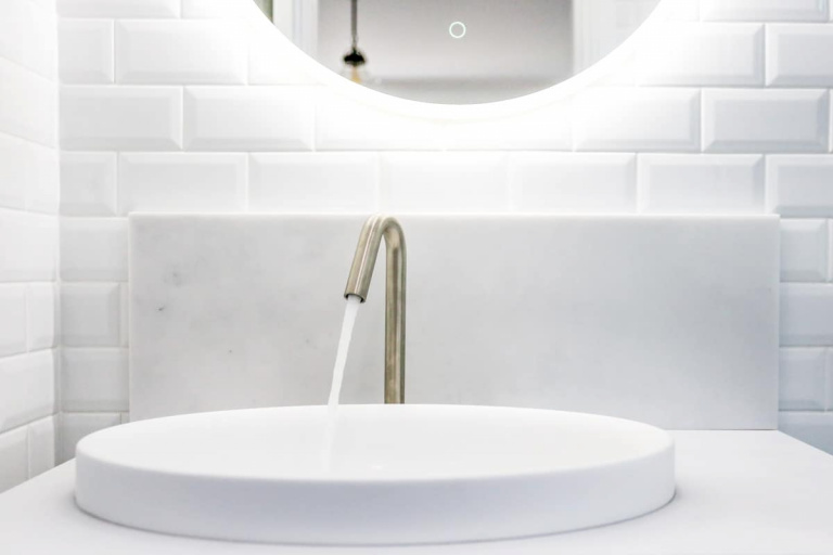 Complete Bathroom Renovation Company photo Small Bathroom Renovation with custom designed vanity white London vanity from ADP and Milli Pure Basin Set with Linear Textured Handles from Reece installed by Nu-Trend with Kado LED Mirror