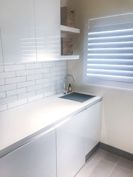 The laundry sink area of a Nu Trend Sydney Bathroom Renovation in Baulkham Hills