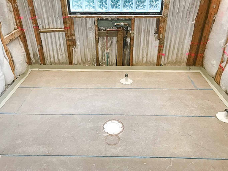 Why floor preparation is crucial for a bathroom renovation.